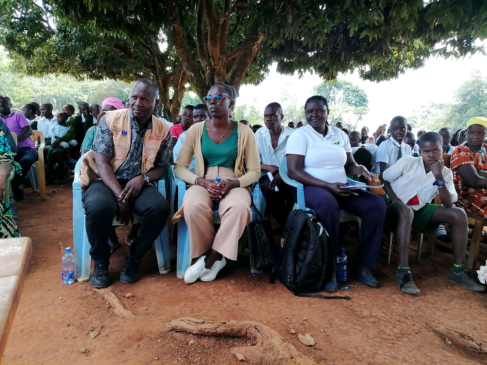 School pupils in green uniforms during a SUCSA climate-smart agriculture session